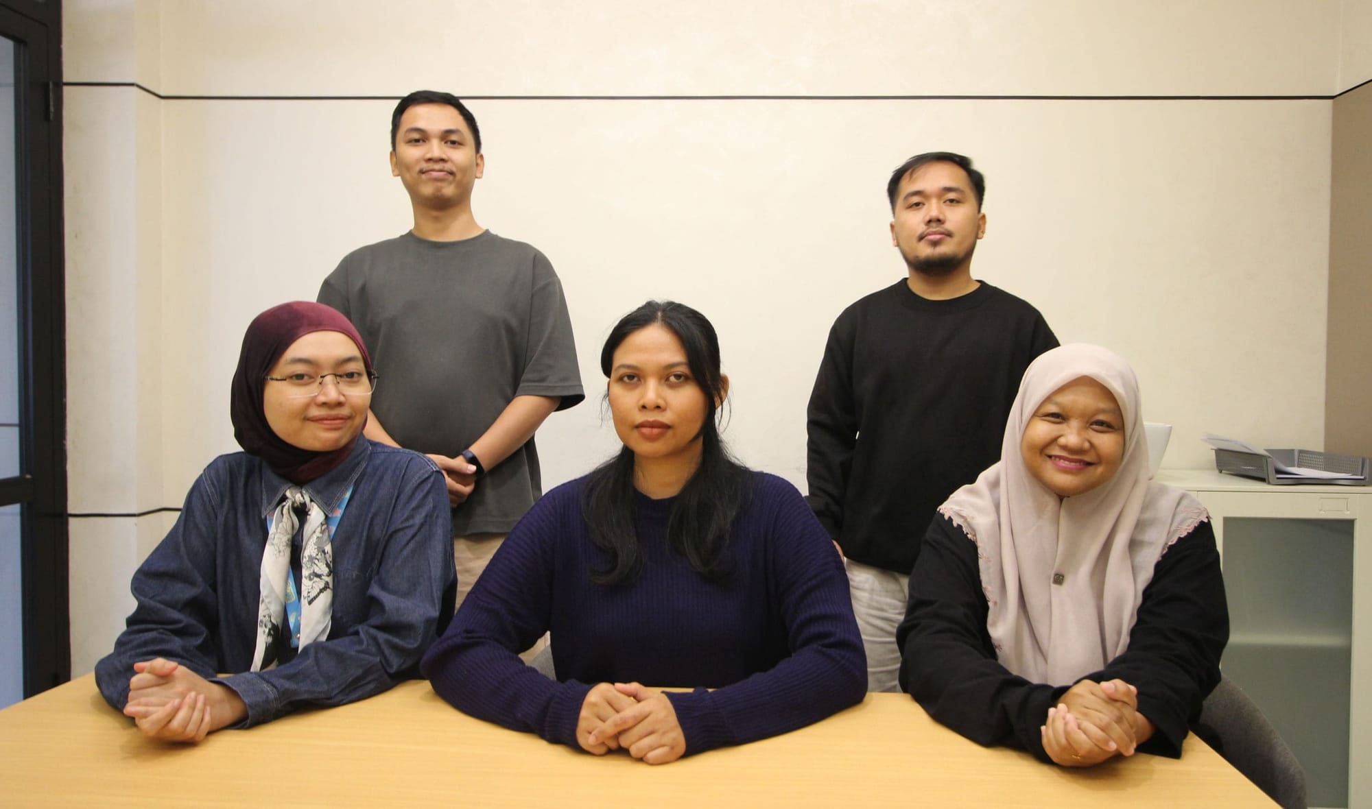 Portrait of the 24Slides AI and Research team members who developed the presentation software testing framework.