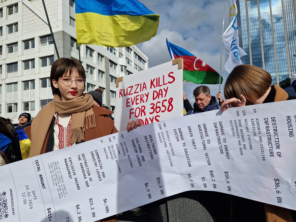 Lietuvos genocido centras ir ukrainiečių bendruomenė Briuselyje paminėjo 2-ąsias Rusijos invazijos į Ukrainą metines | LGGRTC nuotr.