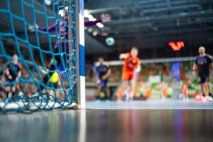 Detail,Of,Handball,Goal,Post,With,Net,And,Handball,Match