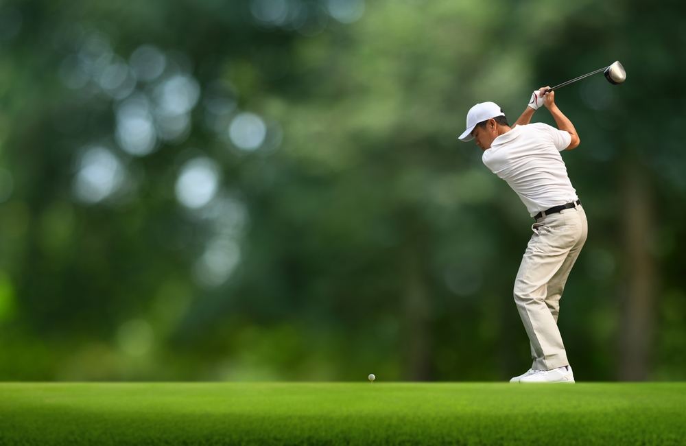 Front,View,Of,Golfer,Driver,Back,Swing,Before,Hitting,Golf