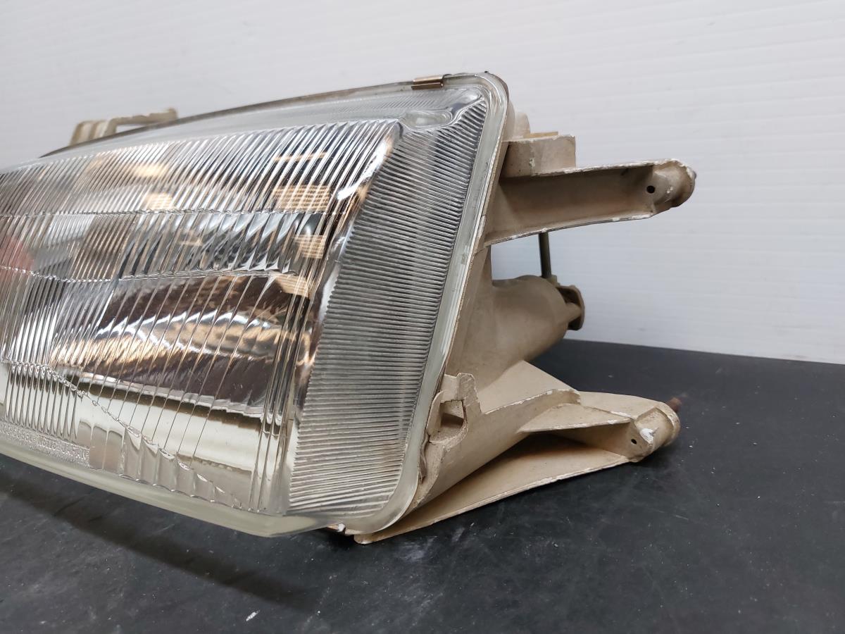 Ótica / farol esquerda SUZUKI Swift II (EA, MA) Imagem-1