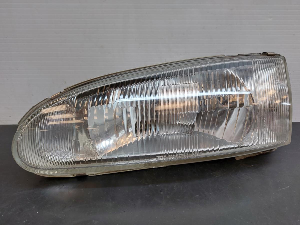 Faro anteriore sinistro MITSUBISHI Colt IV (CA_A)