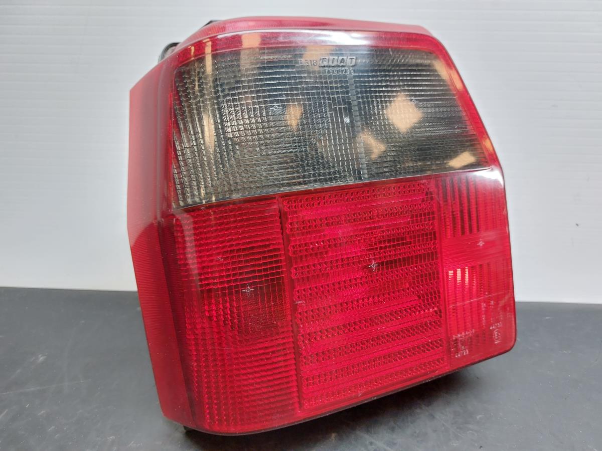 Farolim esquerdo FIAT Uno (146_)