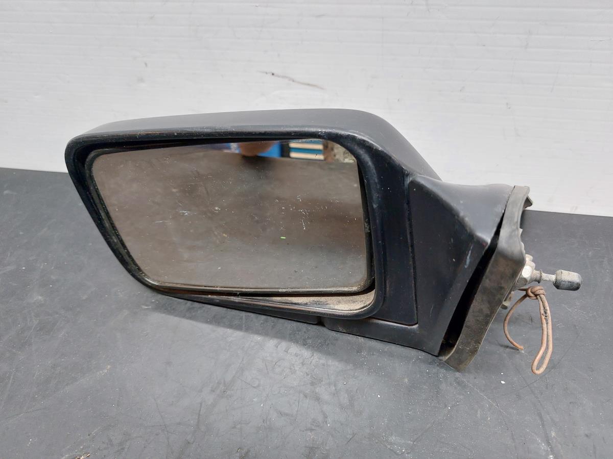 Left mirror NISSAN Bluebird Sedan (U11)