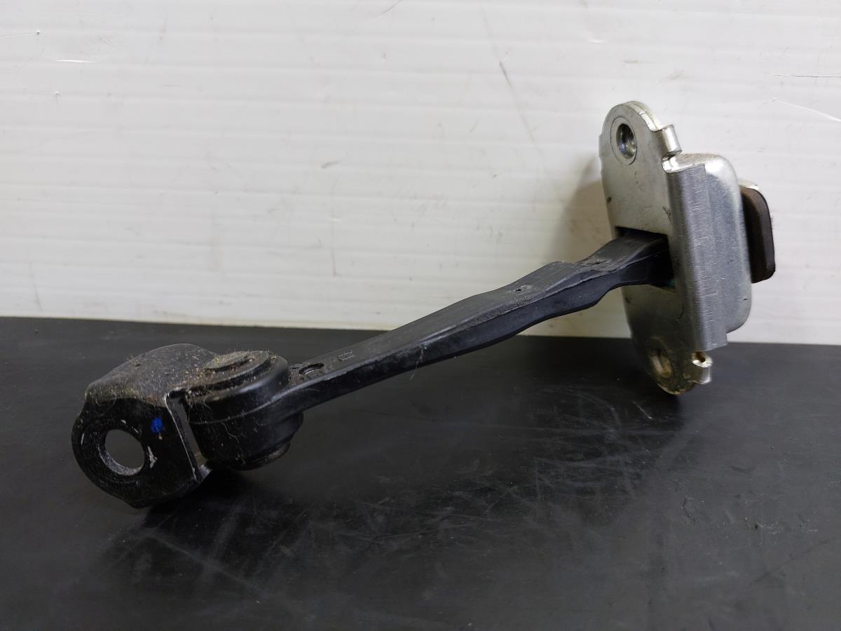 Esticador / limitador porta frente esquerdo NISSAN Micra IV (K13)