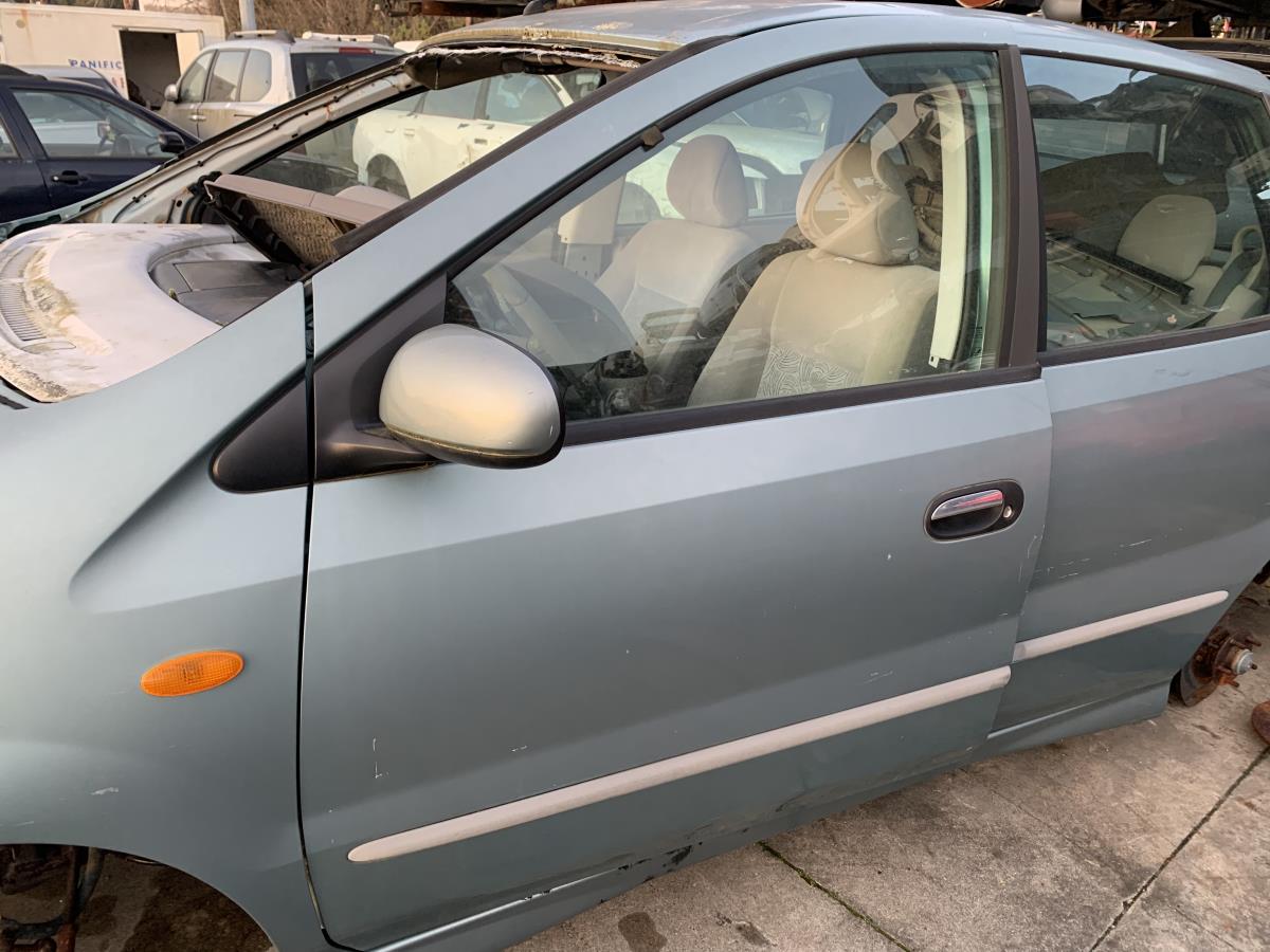 Porta frente esquerda NISSAN Almera Tino (V10)