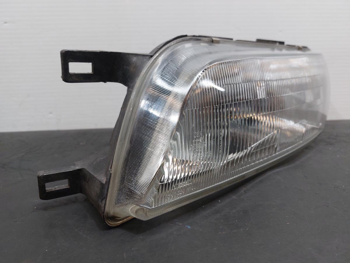 Phare avant gauche NISSAN Almera I Hatchback (N15) Imagem-1