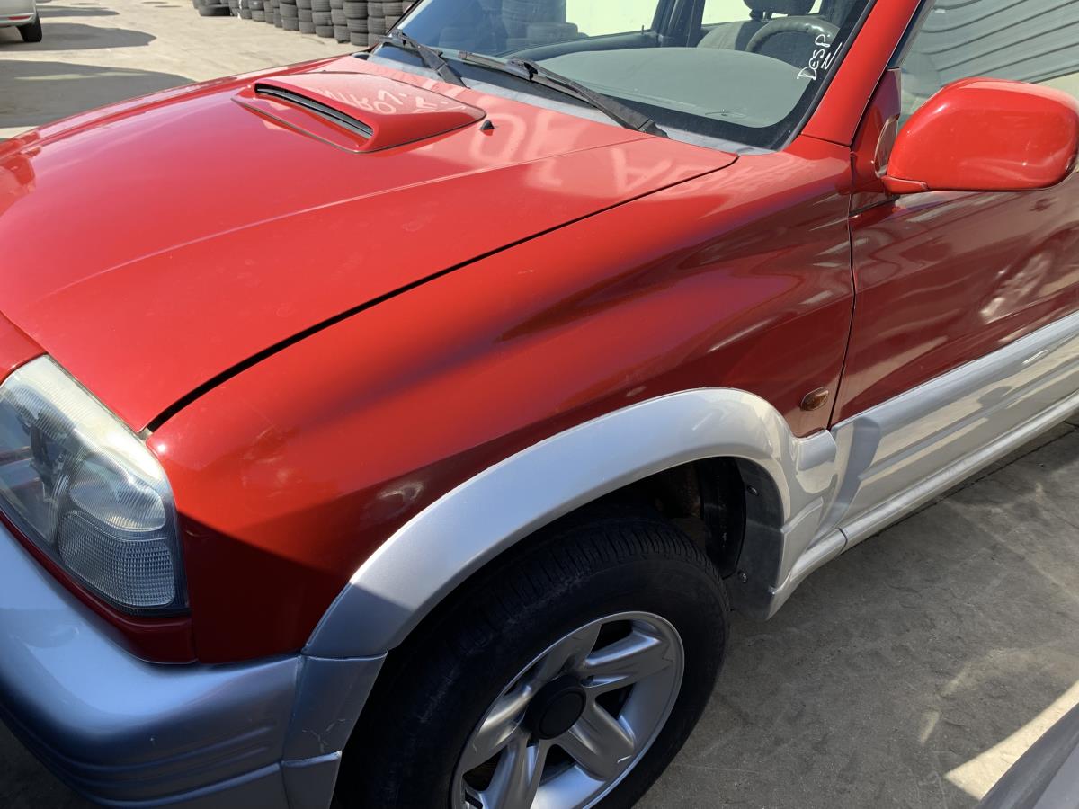 Guarda-lamas esquerdo SUZUKI Grand Vitara I (FT, HT) | 1998 - 2008