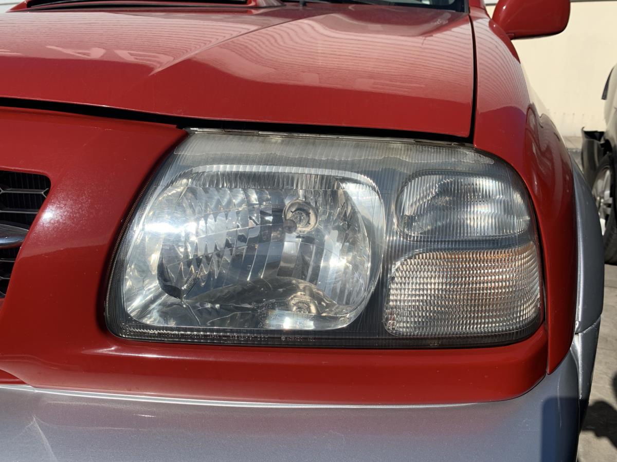 Ótica / farol esquerda SUZUKI Grand Vitara I (FT, HT)