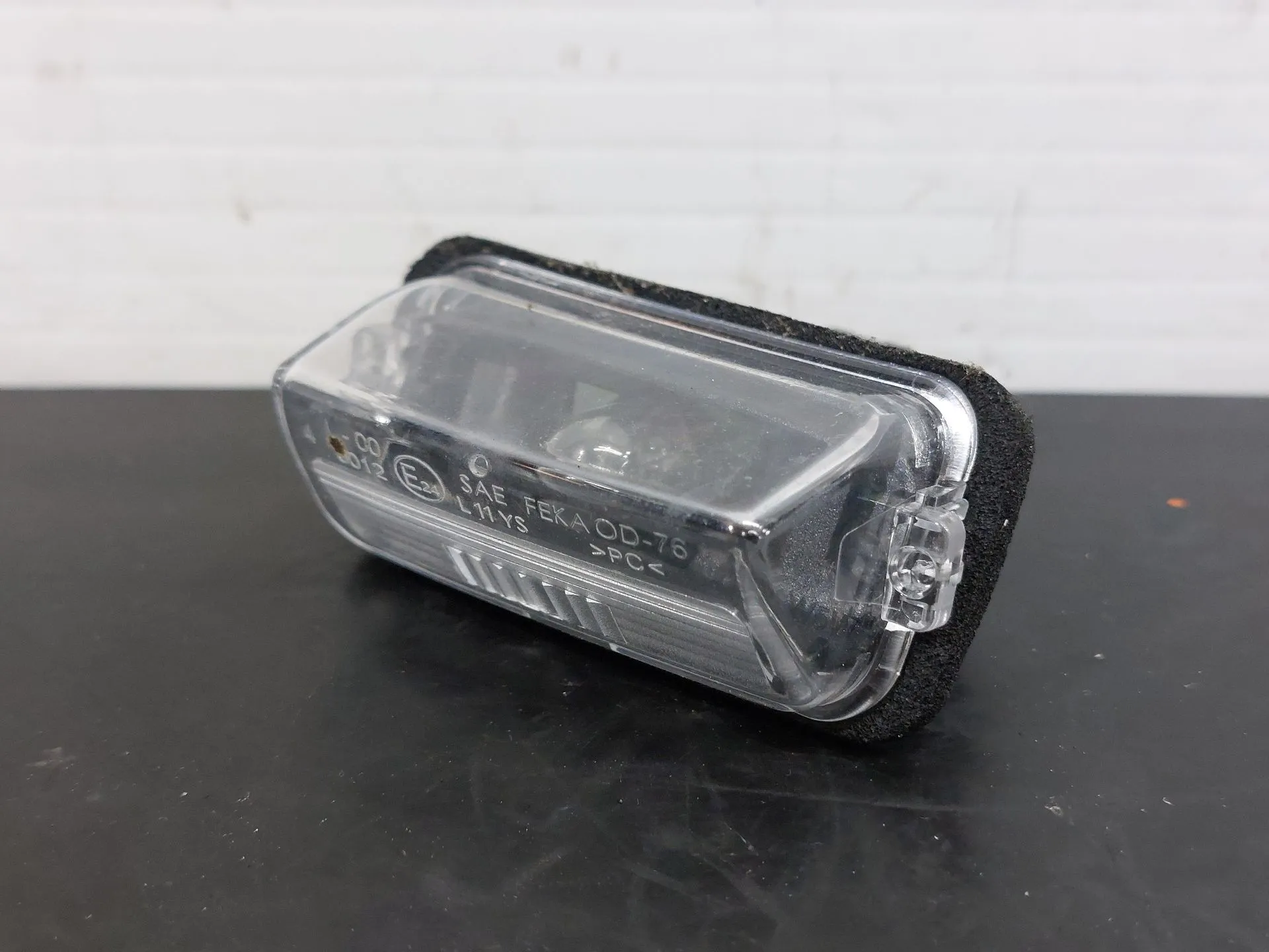 License plate light TOYOTA Yaris (_P15_)