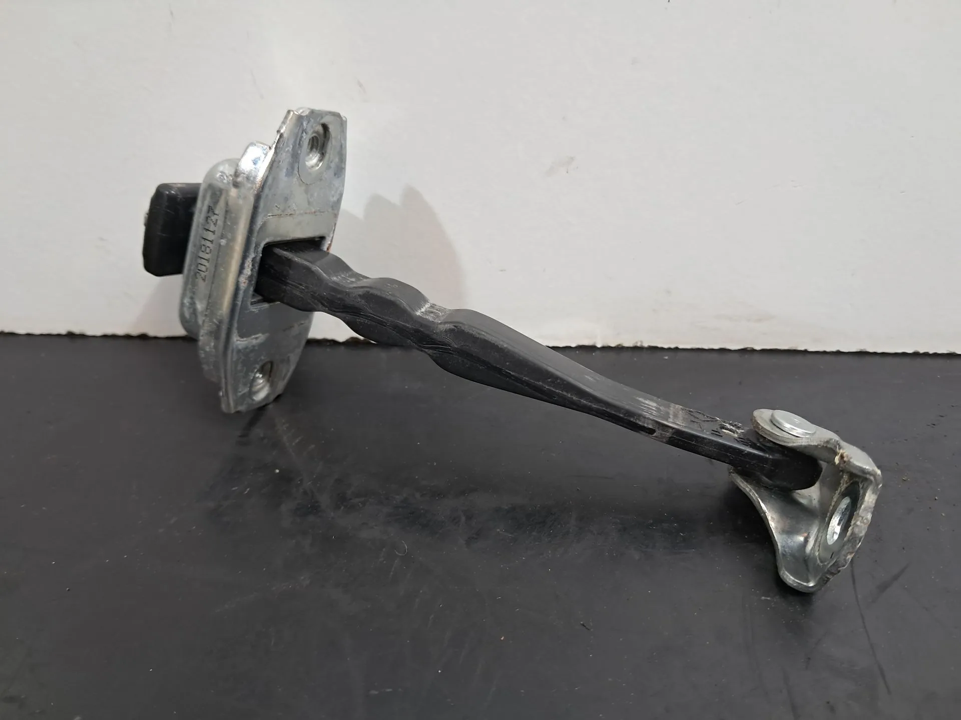 Limitador de puerta delantero derecho NISSAN Micra V (K14)
