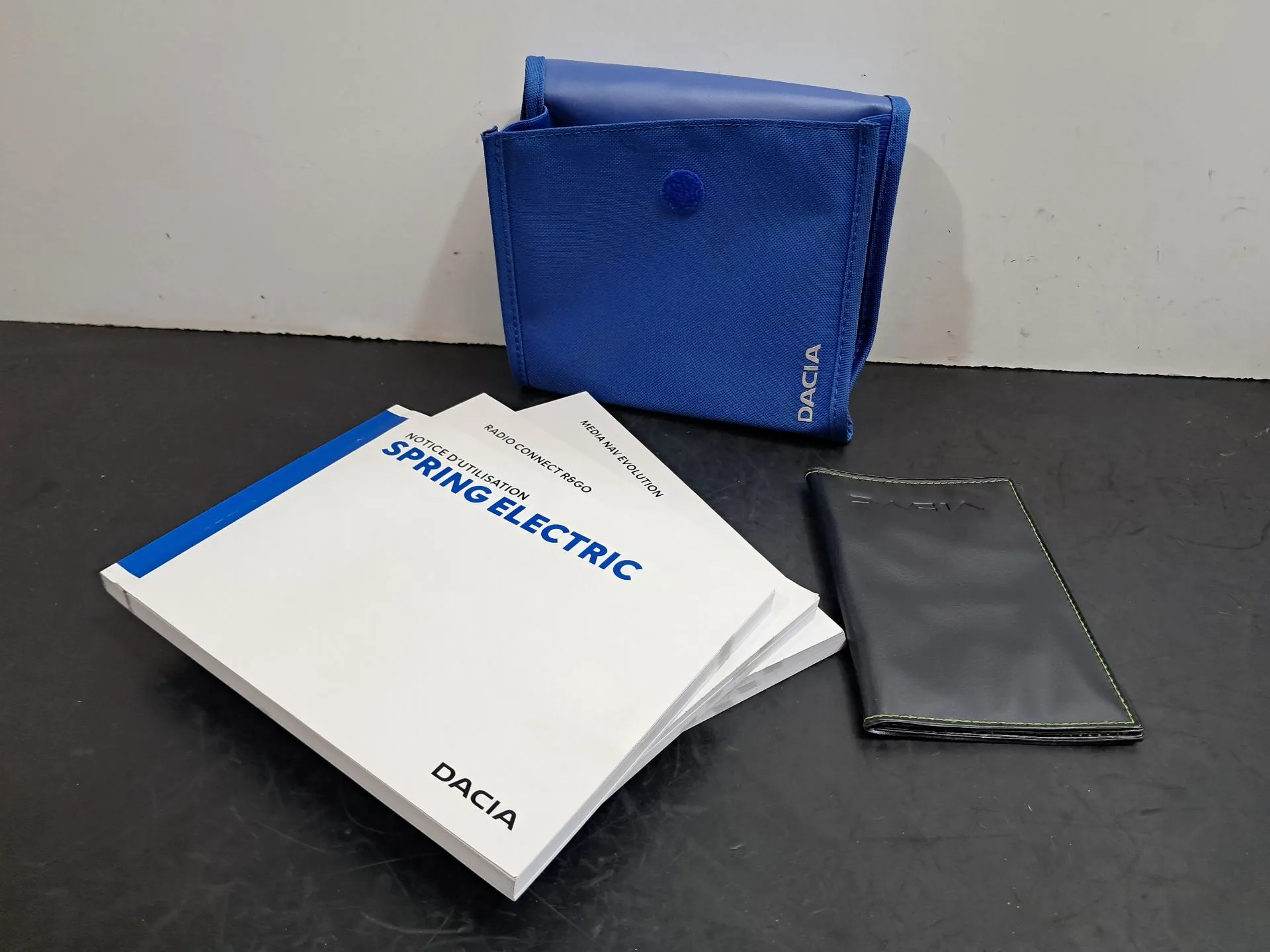 Bolsa com manual de utilizador do veículo DACIA Spring Imagem-2