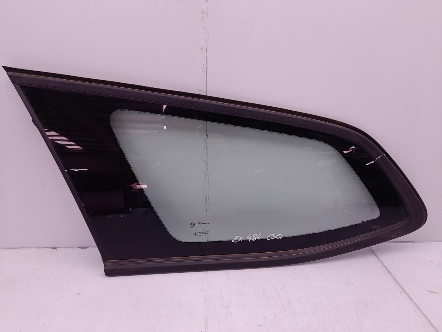 Left rear quarter glass