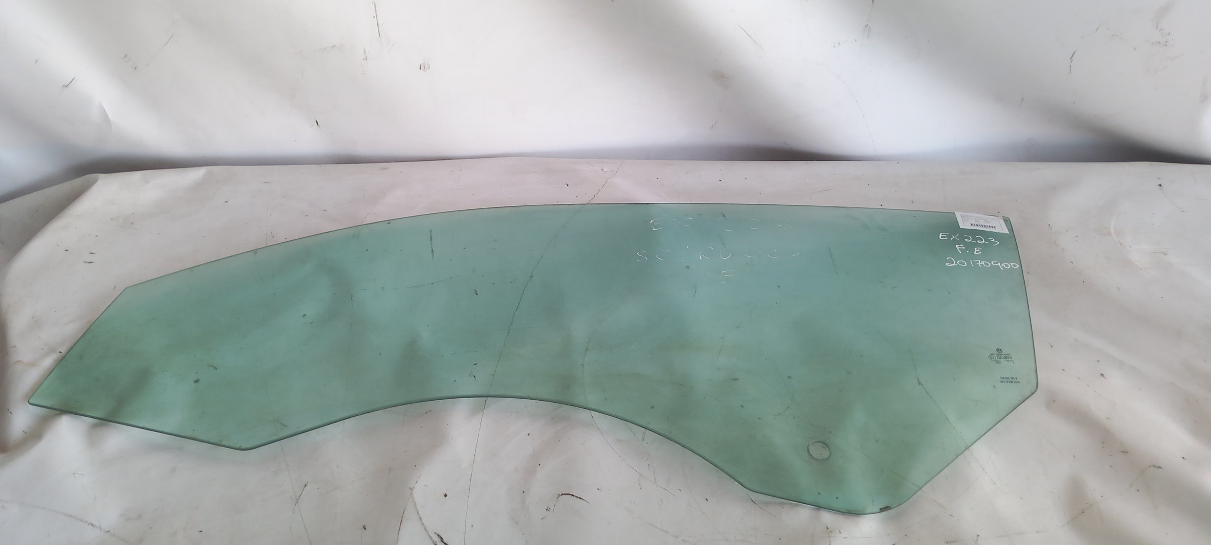 Left front door glass