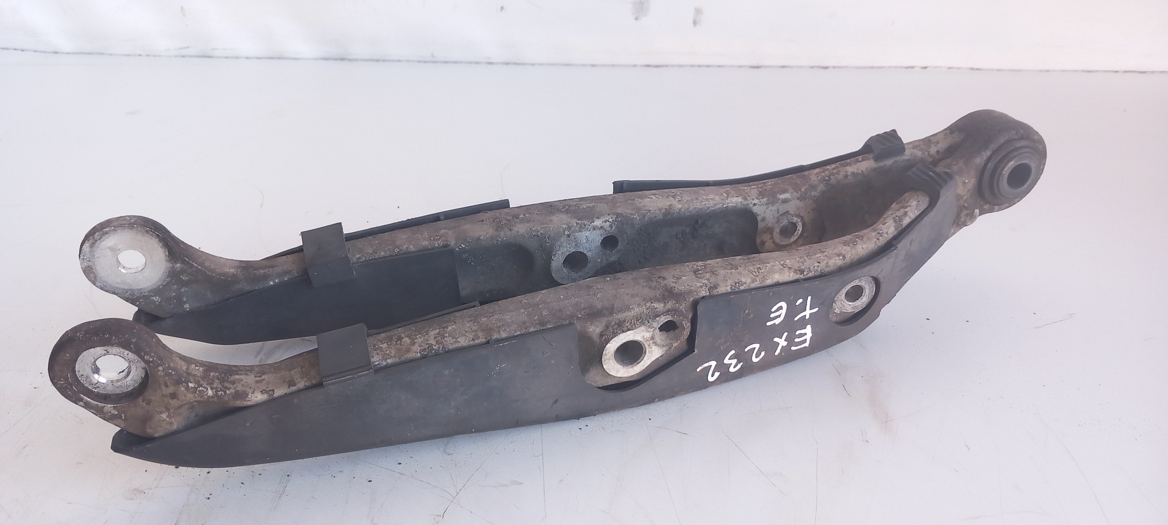 Bras de suspension arrière gauche