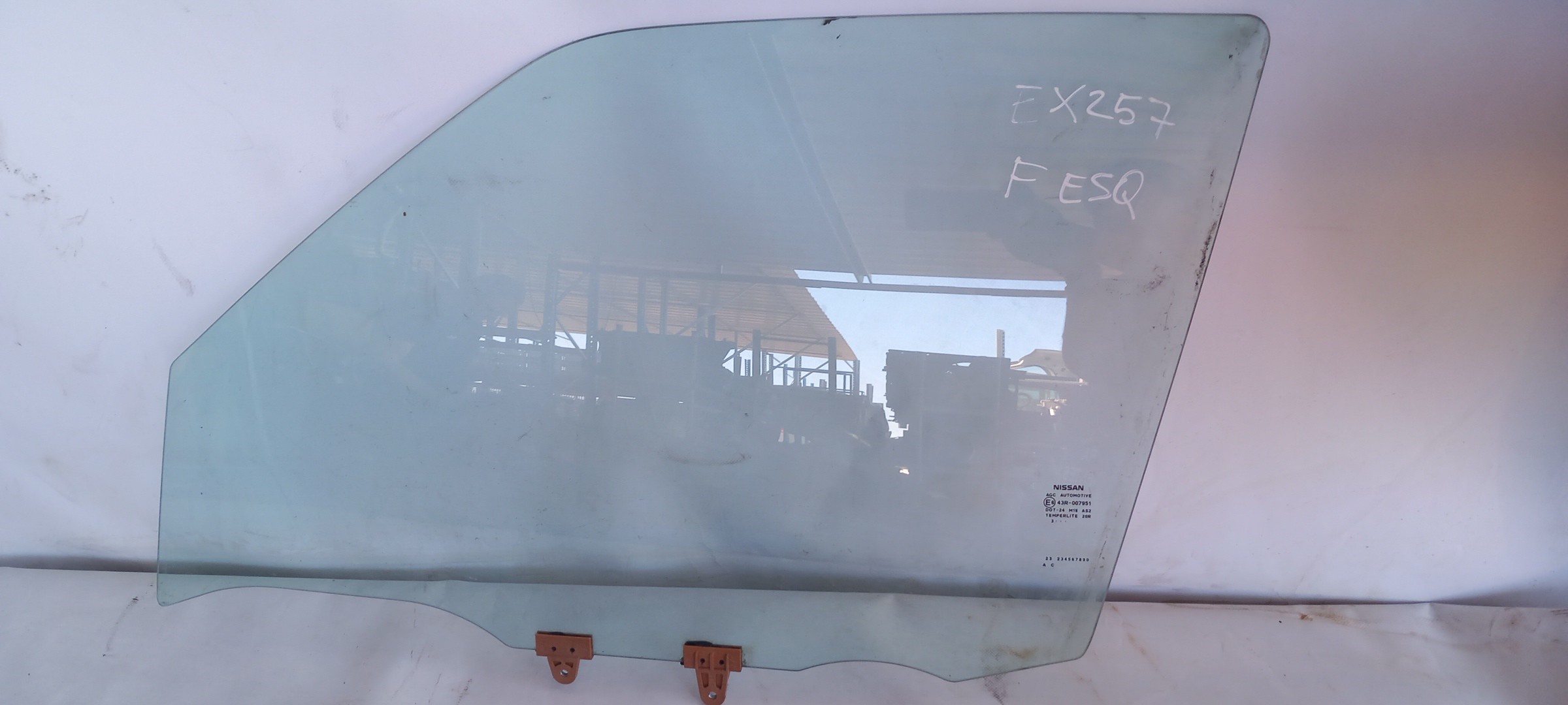 Left front door glass