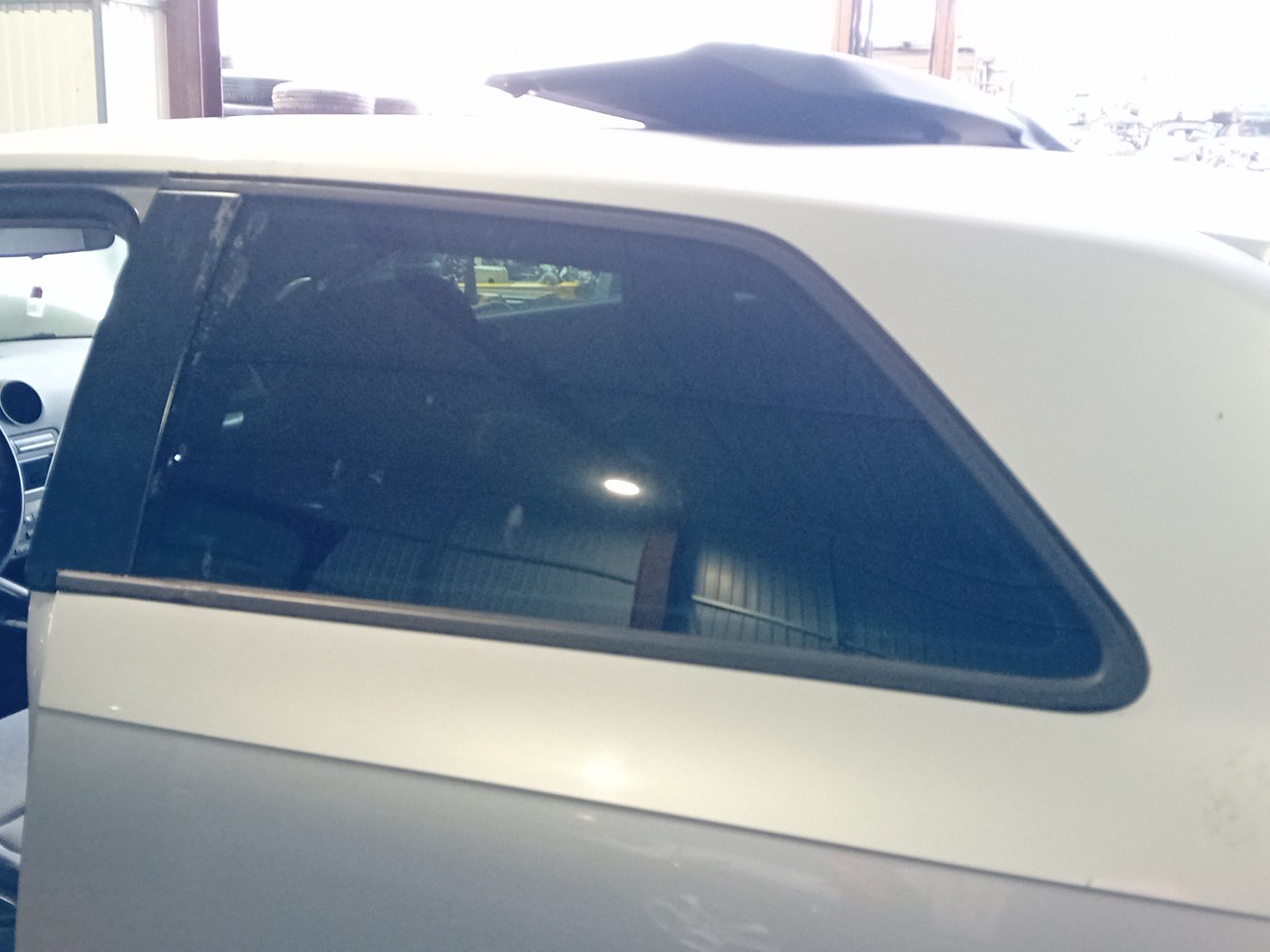 Left rear quarter glass