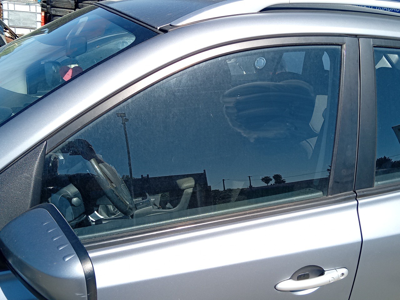 Left front door glass