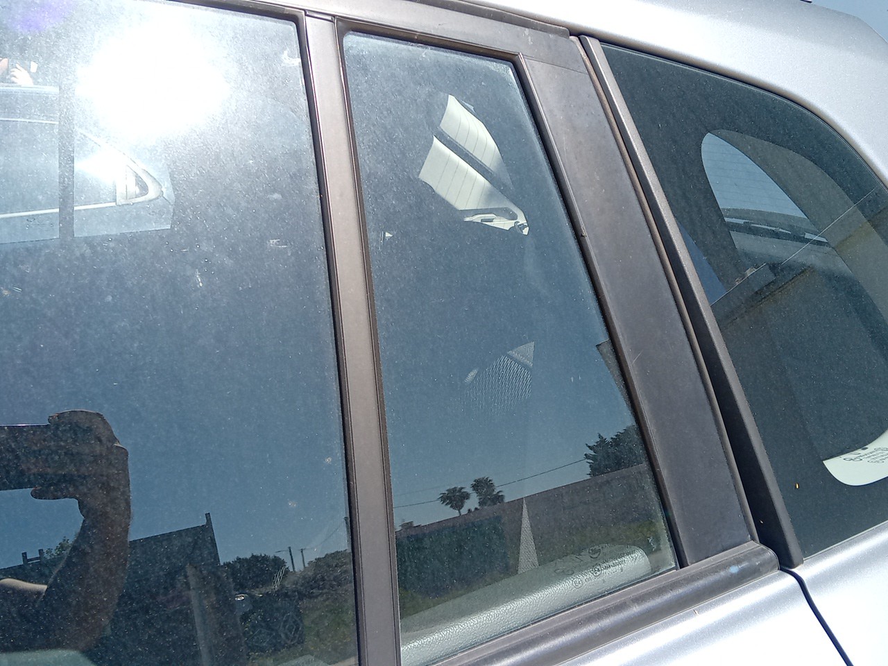 Left rear triangle window