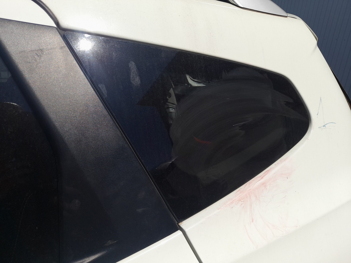 Left rear quarter glass
