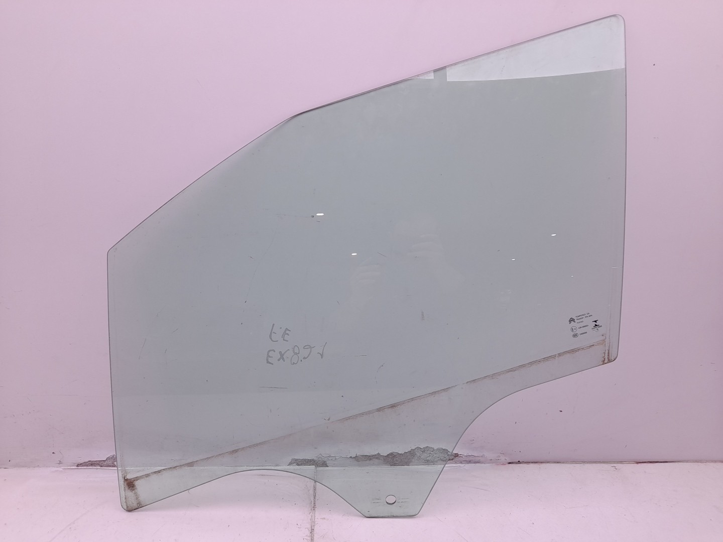 Left front door glass