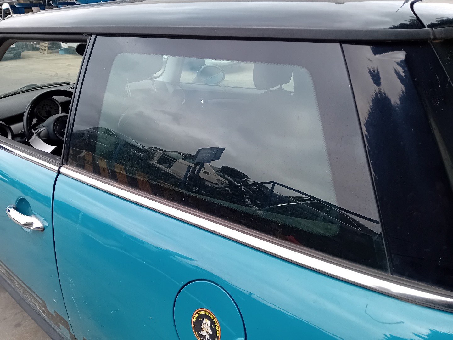 Left rear quarter glass