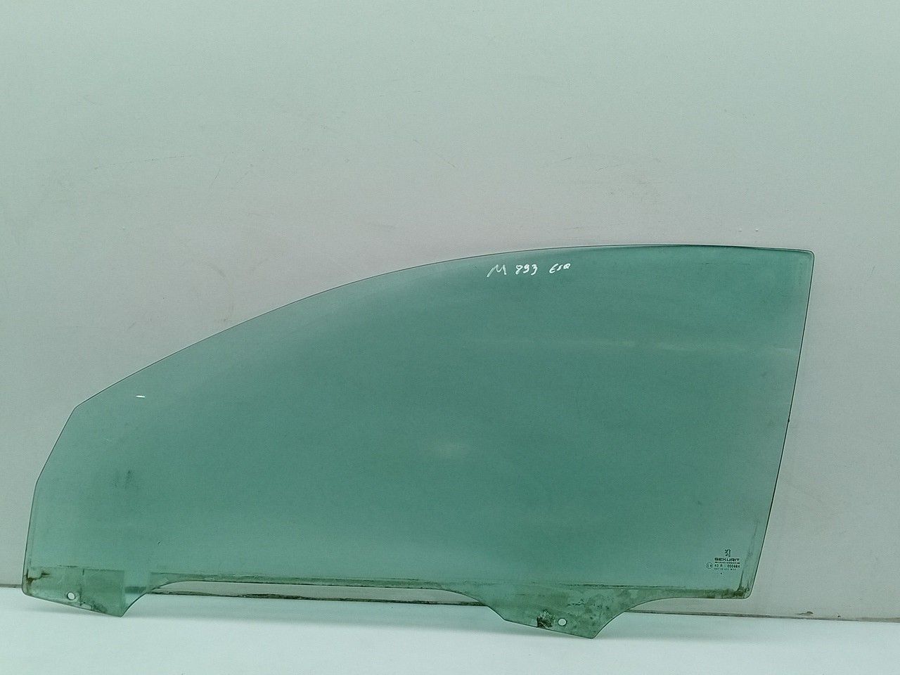 Left front door glass