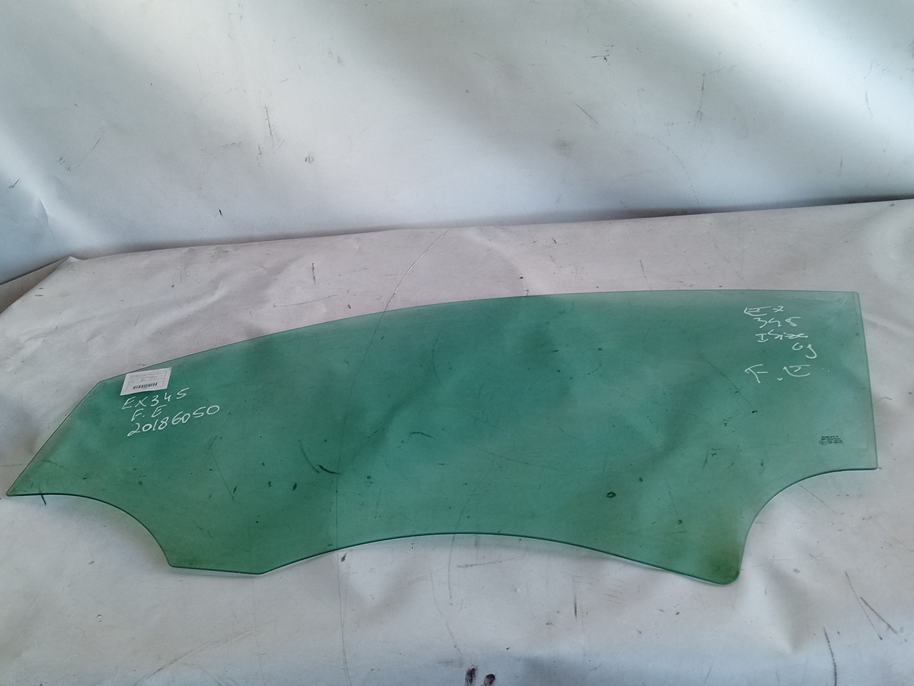 Left front door glass