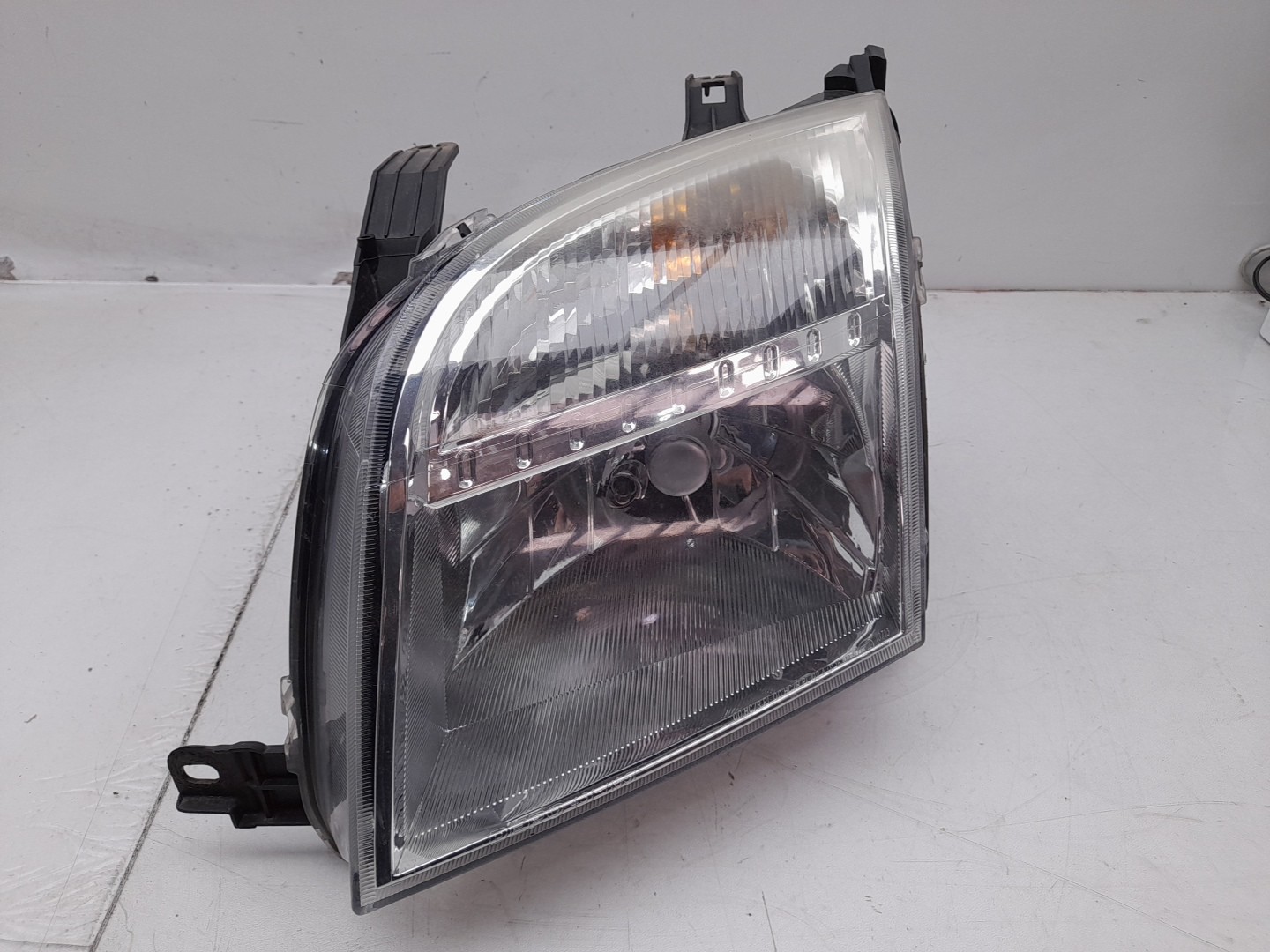 Ótica / farol esquerda