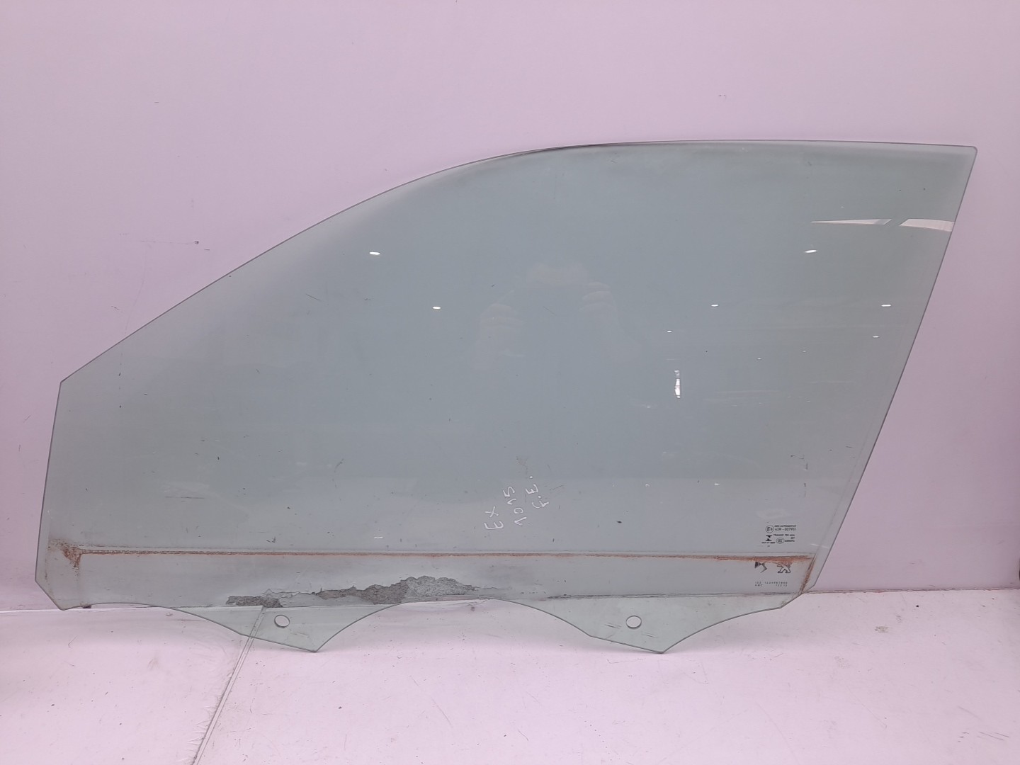 Left front door glass