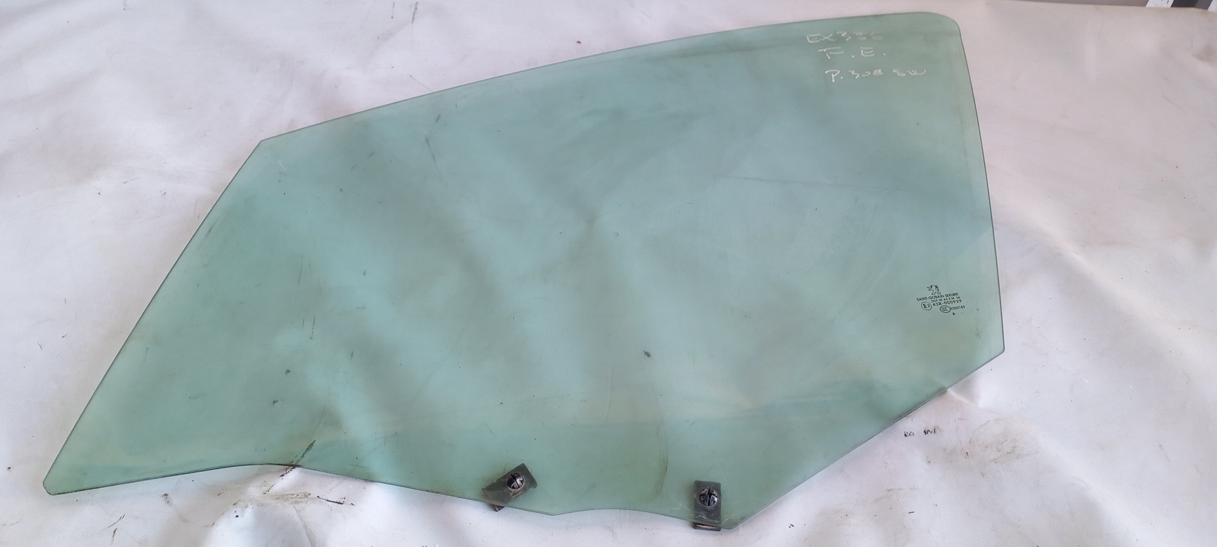 Left front door glass