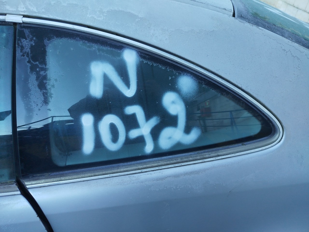 Left rear quarter glass
