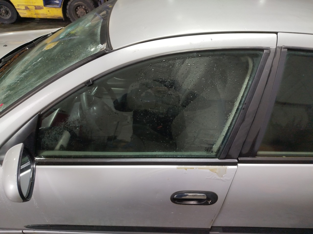 Left front door glass