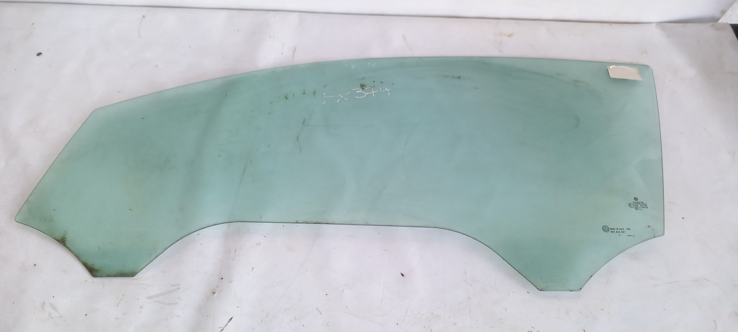 Left front door glass