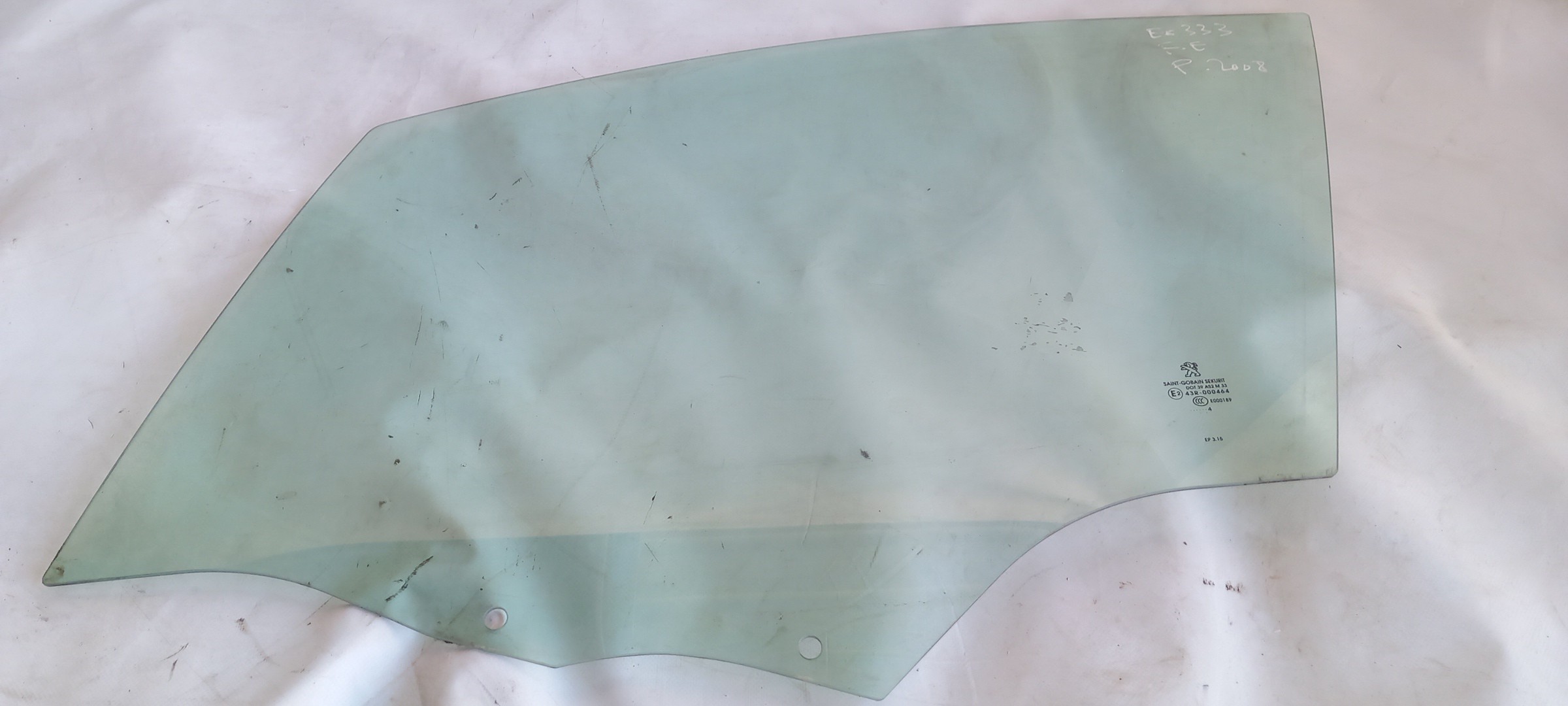 Left front door glass