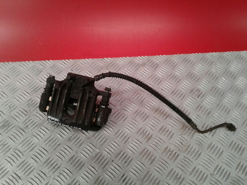 Pinça travão / maxila de travão trás esquerda HYUNDAI Santa Fé II (CM)