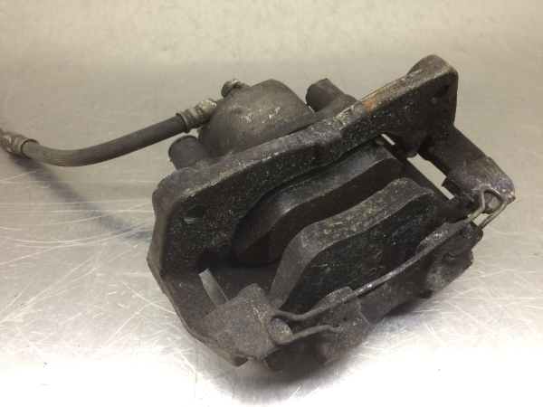 Pinça travão / maxila de travão frente esquerda TOYOTA Yaris (_P13_)