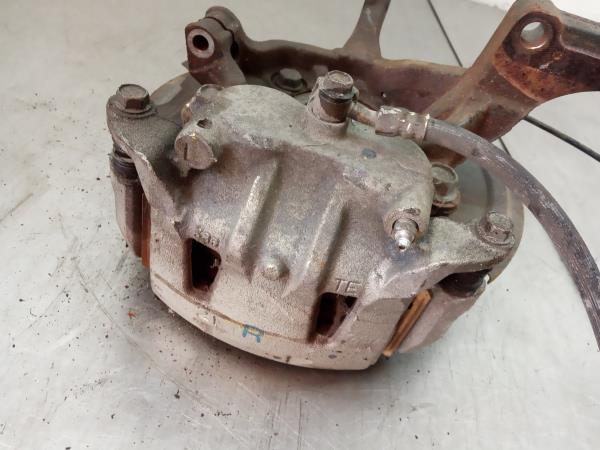 Pinça travão / maxila de travão frente esquerda NISSAN NV200/Evalia Combi (M20)