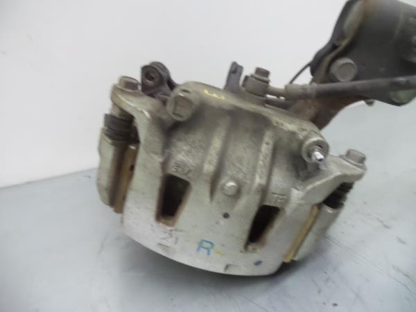 Pinça travão / maxila de travão frente esquerda NISSAN NV200/Evalia Combi (M20)