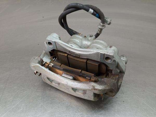 Pinça travão / maxila de travão frente esquerda NISSAN Leaf EV (ZE1)