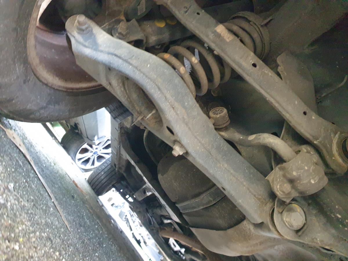 Left rear suspension arm KIA Sportage (SL)