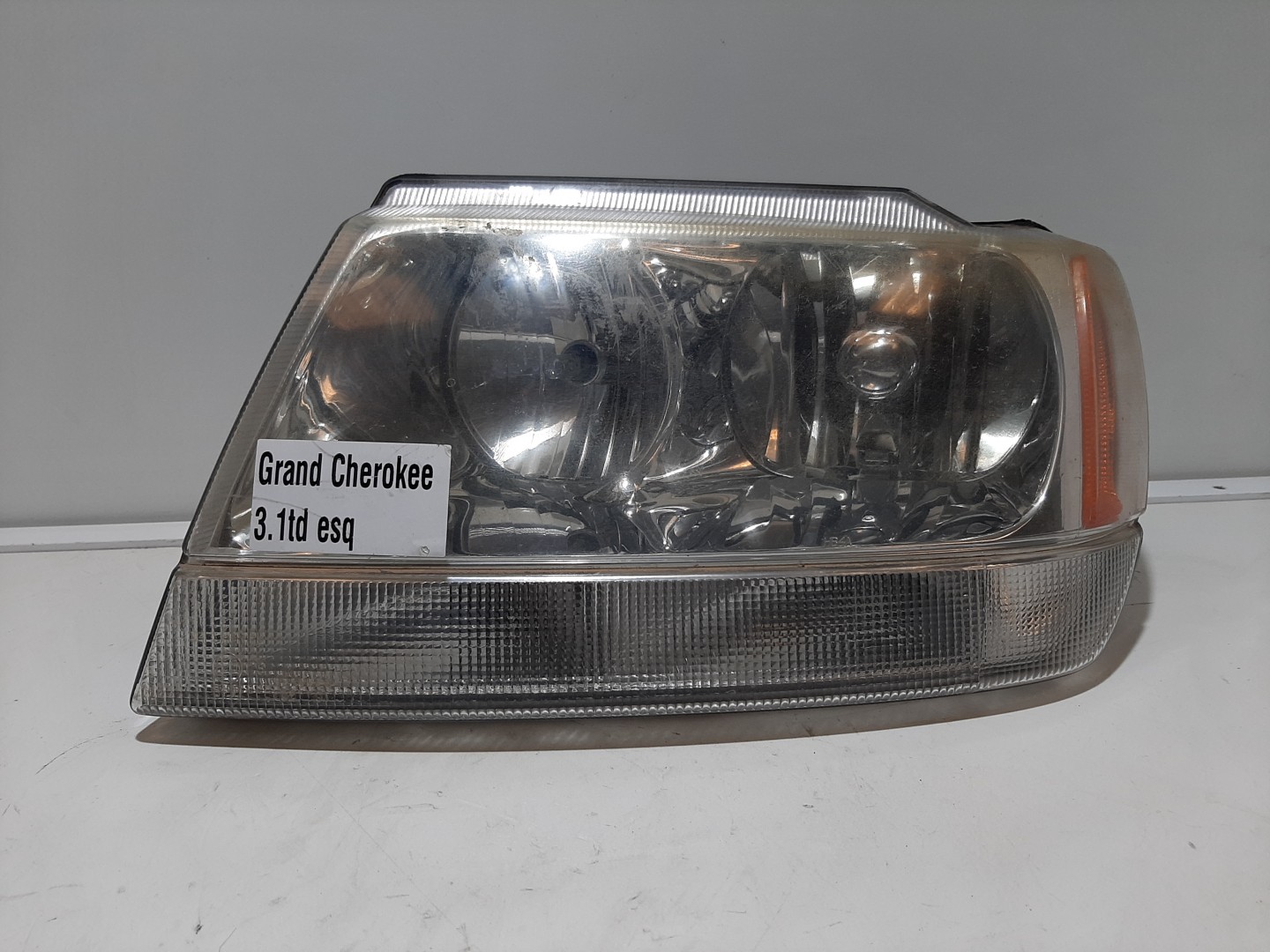 Ótica / farol esquerda JEEP Grand Cherokee II (WJ, WG)