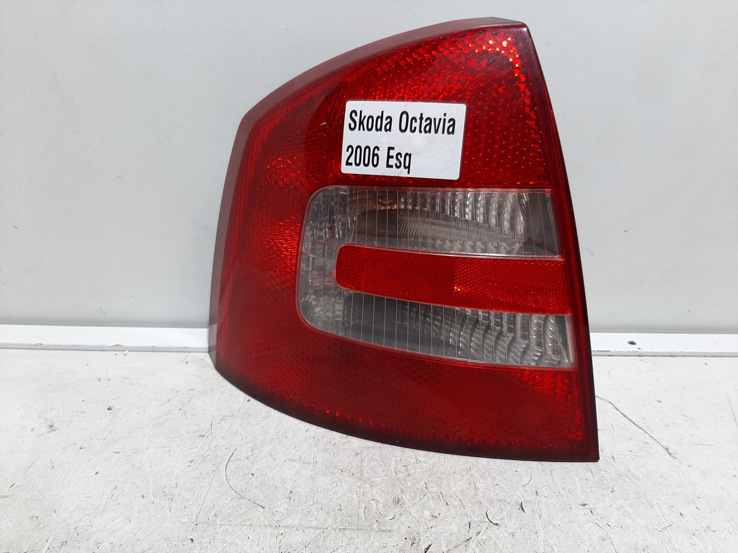 Farolim esquerdo SKODA Octavia II Break (1Z5)
