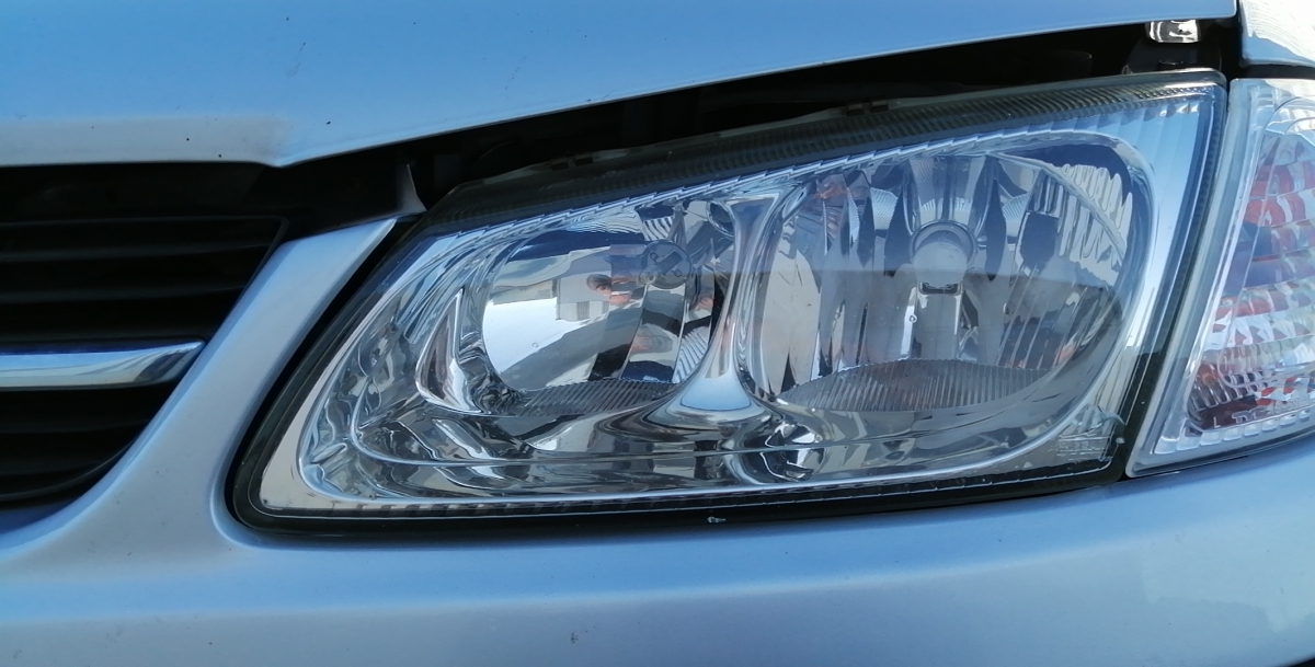 Left Headlight NISSAN Almera II Hatchback (N16)