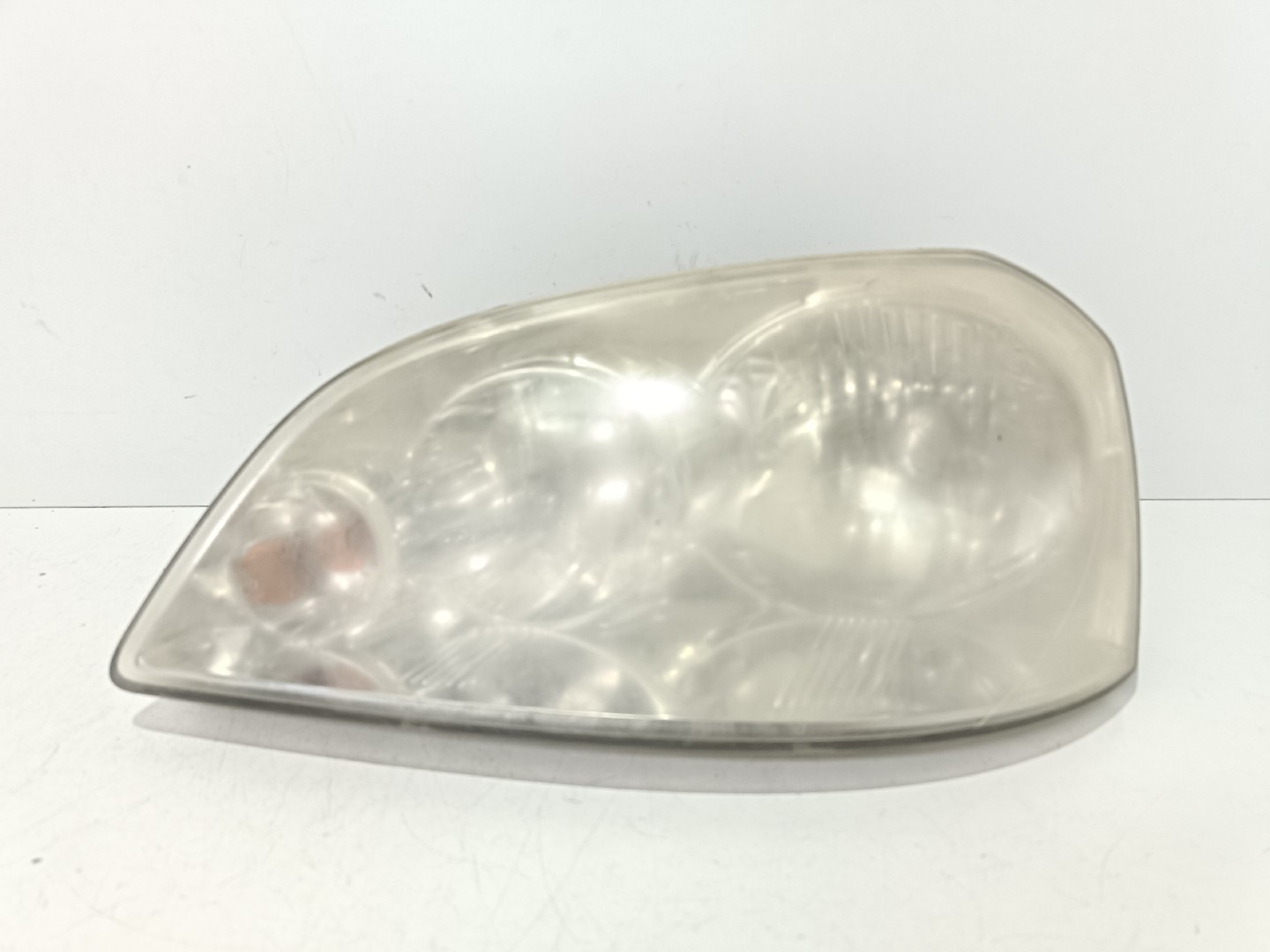 Ótica / farol esquerda CHEVROLET Nubira Sedan