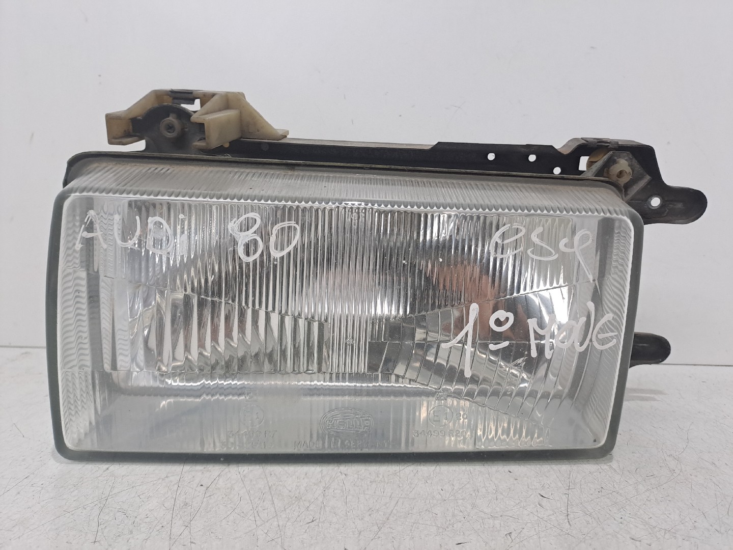 Ótica / farol esquerda AUDI 80 (81, 85, B2)