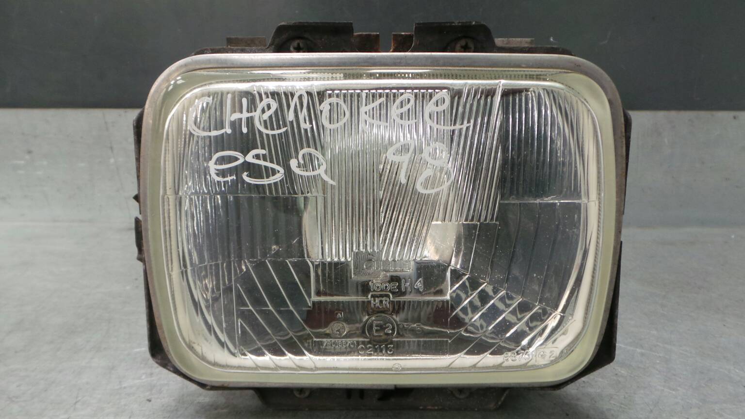 Ótica / farol esquerda JEEP Cherokee (XJ)
