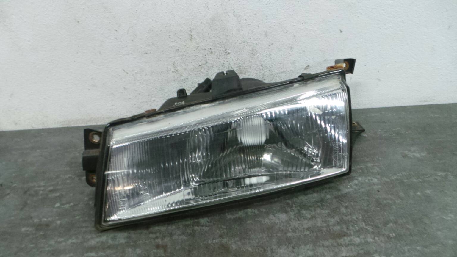 Ótica / farol esquerda HYUNDAI Pony III (X2)