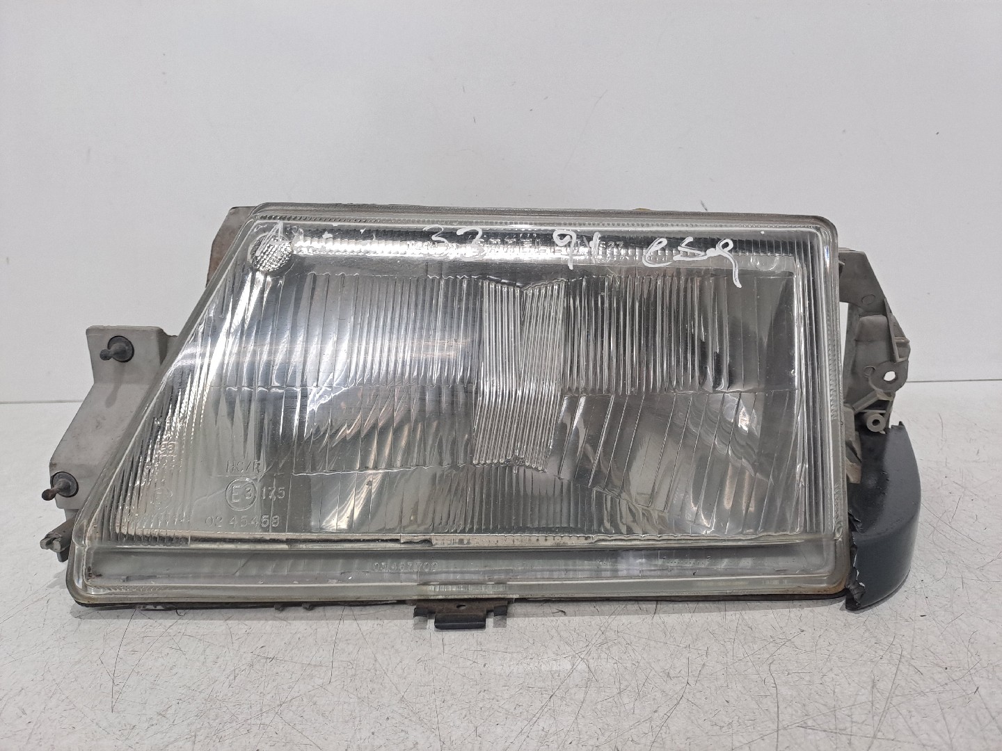 Left Headlight ALFA ROMEO 33 (907A_) | 90 - 94