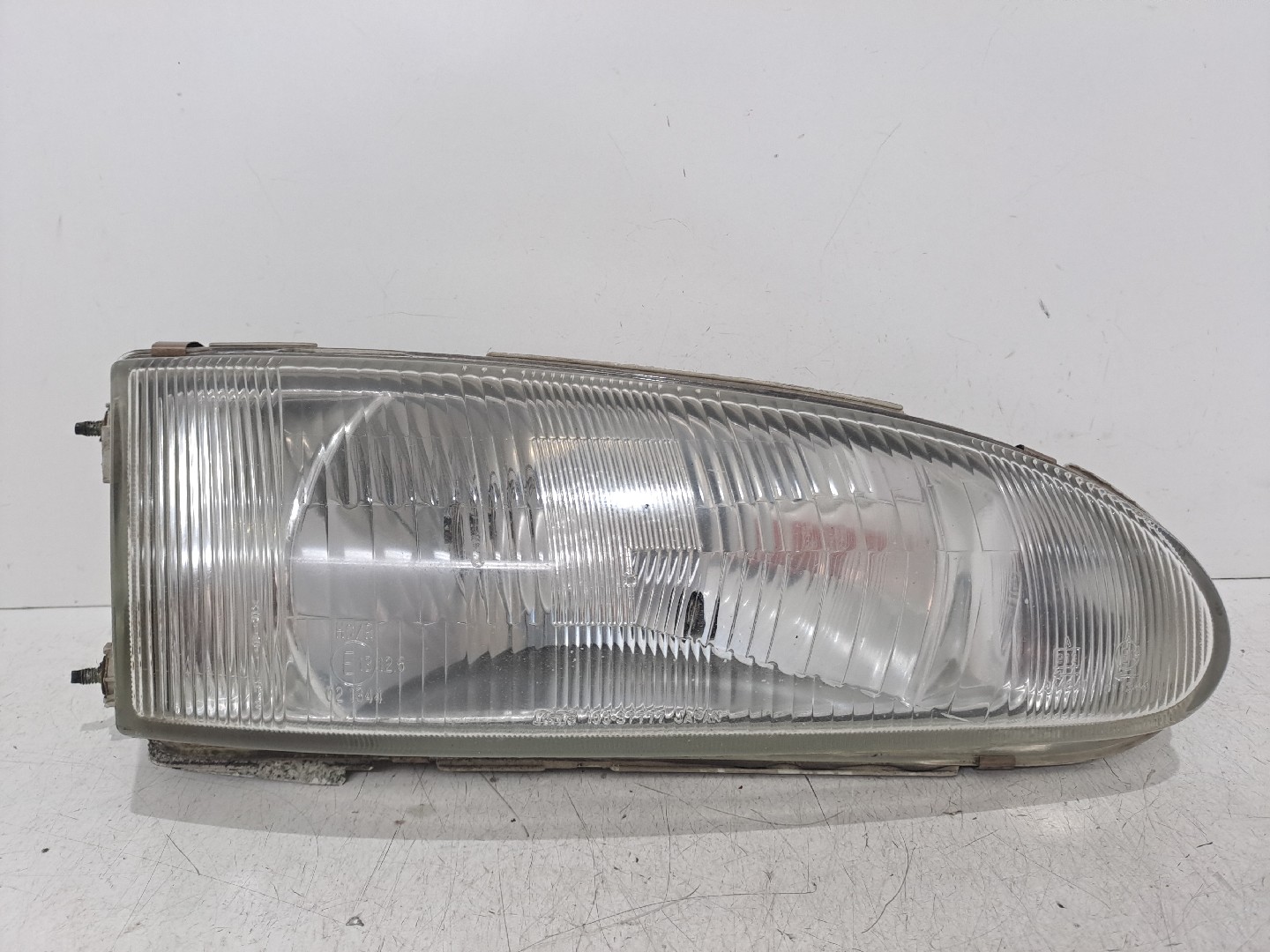 Optica direita MITSUBISHI COLT IV (CA_A) | 92 - 96